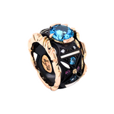 Donatello Ring with Blue Topaz, Rhodolite Garnet and Diamond