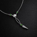 Midnight Necklace with Black & White Diamonds and Garnet Tsavorites